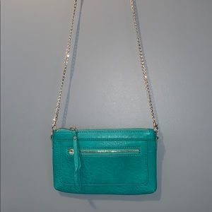 Teal green purse with gold chain